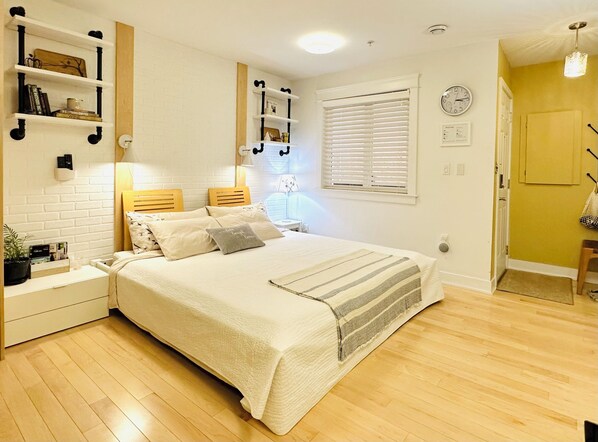 California king-size bed with an organic latex mattress and Egyptian linen.