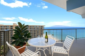 Unwind on your private lanai where island wines meet sweeping ocean blues and sunsets steal the whole show WH1-1211