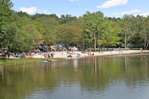 Private Beach Paradise: Swim, sunbathe, and savor the stunning lake views just 1.1 miles away!