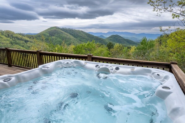 Relax in our hot tub while taking in the expansive mountain views.