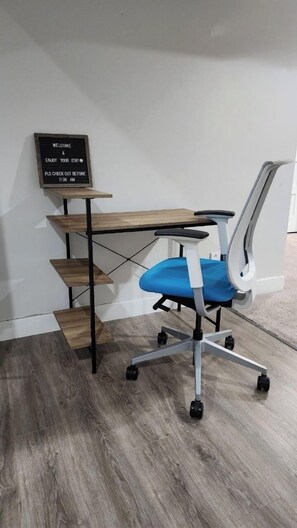 Dedicated workspace area with an ergonomic chair 