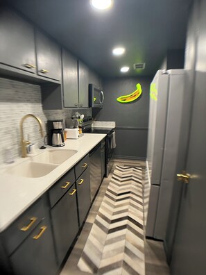 Fully equipped galley kitchen w/ plateware/silverware for eight