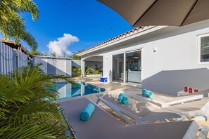 This gorgeous, spacious and modern home is one of a kind! It's the perfect getaway, boasting high-end finishes and amenities. The private pool with sunbathing area and outdoor shower are just added bonuses.