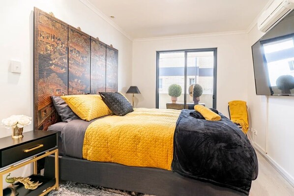 main bedroom with blackout roller blinds 