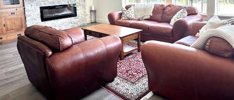 Living room with views over the Monashee mountains. 75 inch smart TV with cable.