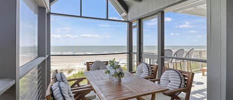 Enjoy the screened porch with views of the beach. Amazing oceanfront condo that is fully renovated!