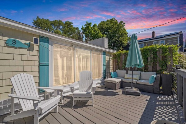 Welcome to the Riverside Cottage Retreat! Ample parking, a beautiful yard, and large deck.