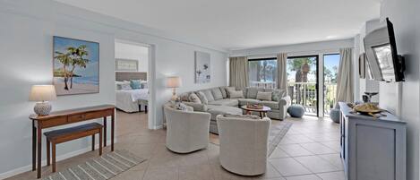 Living area with large private balcony and Gulf views.