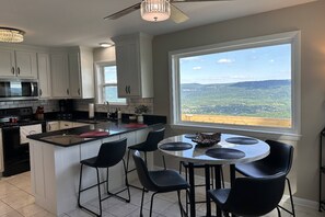 Grab a cup of coffee or catch-up on e-mails (only if you must) at the table with a view