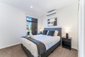 Bedroom 2 - with queen bed and ample storage