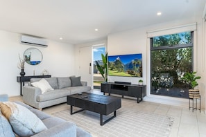 Living room with TV and ample seating