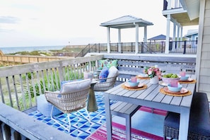 Dining al fresco with the sound of the crashing waves