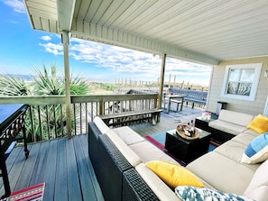 Huge covered porch for those rainy beach days or when you just want to lay and listen to the waves crash