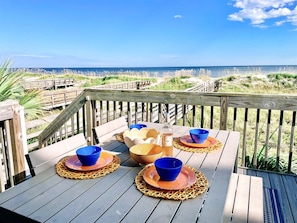 Dining al fresco with the sound of the crashing waves