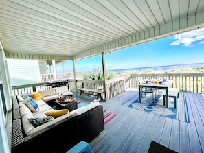 Huge covered porch for those rainy beach days or when you just want to lay and listen to the waves crash