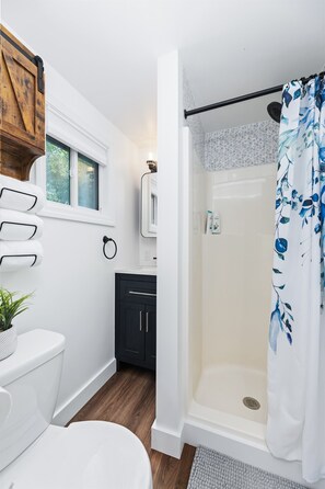 Bathroom with small, stand up shower