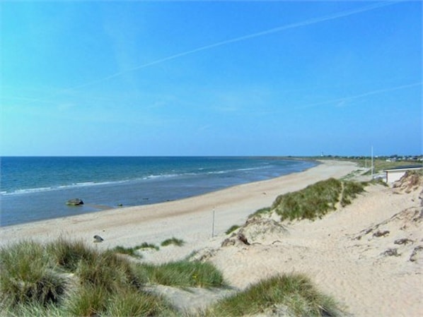 The sandy beach next to the cottage