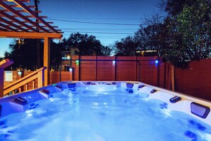 The all year round swim spa can be used as a plunge pool or a 10-person hot tub.