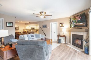 Large television and cute decor for you to enjoy!