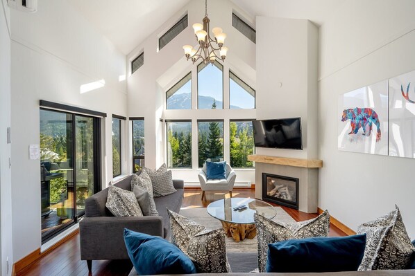 Living area: Access to private patio, TV, gas fireplace