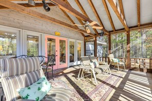 Screened-In Porch | Seating | Dining Table | Water Views