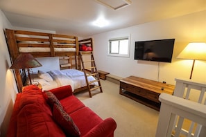 Bunk room with living area.