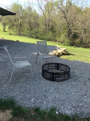 Fire pit with complimentary wood and marshmallow/hot dog sticks