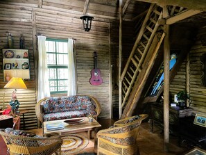 Living room and stairway to second floor