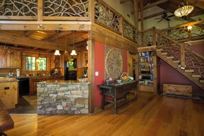 Well-equipped kitchen overlooking the living room and dining area