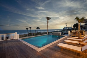 Large Pool Overlooking Ocean