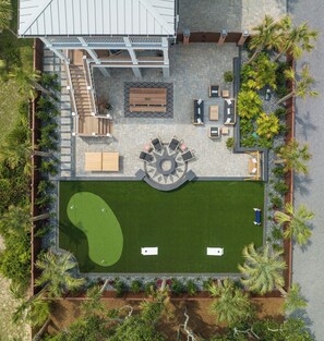 Private Backyard Oasis with Putting Green, Firepit, PingPong, Cornhole, and Outdoor Dining/Bar with TV