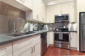 Knock up a gourmet meal with your fully-equipped kitchen. The kitchen is stocked (200-piece culinary set) and has a full line of new appliances.