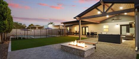 Backyard, fire-pit, lounge, pool, outdoor dining and tv