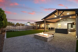 Backyard, fire-pit, lounge, pool, outdoor dining and tv