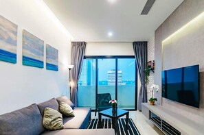 A living area with a balcony.