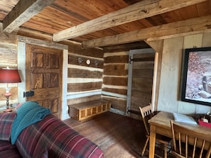 Entry with Coat Hooks and Bench for Seating.