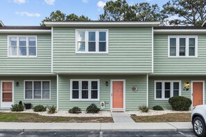 Private townhome with keyless contact free check-in and 2 parking spaces.