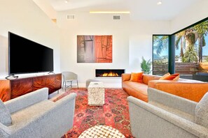 Living Room with Fireplace and TV