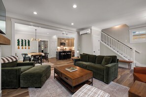 Open-concept kitchen, living and dining rooms