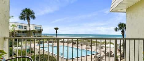 Private Balcony overlooking the pool and beautiful Crescent Beach