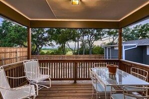 Stylish patio with a modern design, ideal for enjoying drinks and meals al fresco.