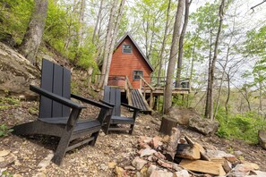 Cozy fire pit area with seating, ideal for gathering under the stars.