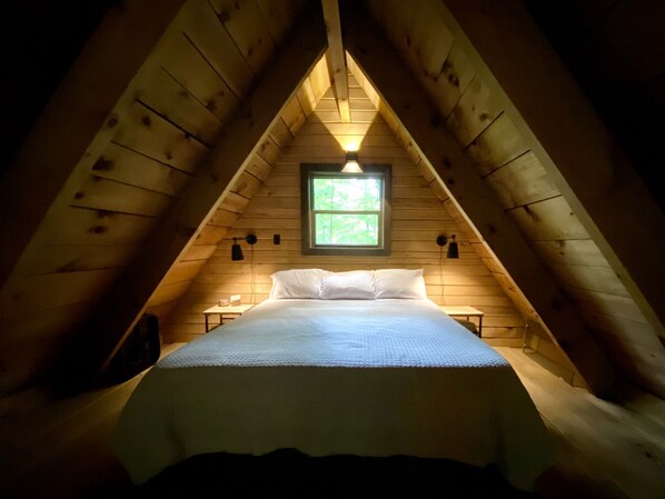 A-frame loft with natural light and forest views—perfect for peaceful mornings.