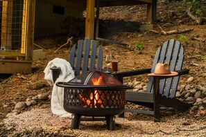 Firepit with Adirondack chairs to keep you cozy at night!