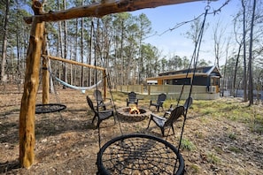 Enjoy the fire pit area under the wide open Oklahoma sky. Here, your backyard is the Ouachita National forest...MIC DROP!
