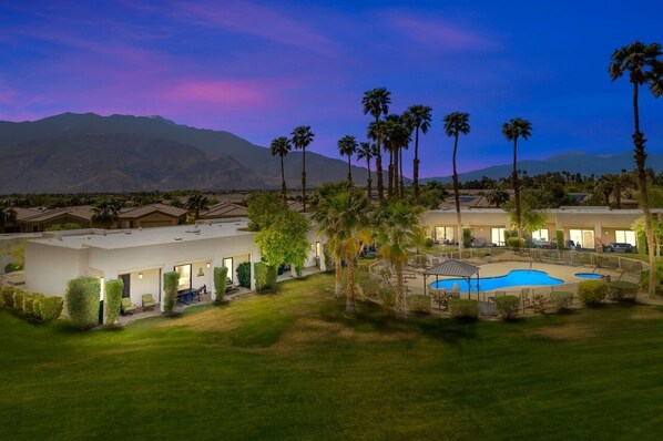 Back yard with fire pit, pool, hot tub and pergola facing San Jacinto mountain!