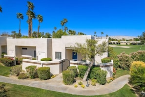 Front right end unit on the golf course! Courtyard, table, stools and grill!