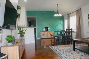 Open concept floor plan from the living to the dining room.