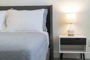 Charge your devices conveniently with our bedside table and USB light.
