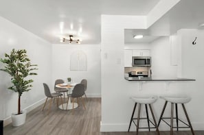 Stay connected in all areas with our bar peekaboo kitchen window!